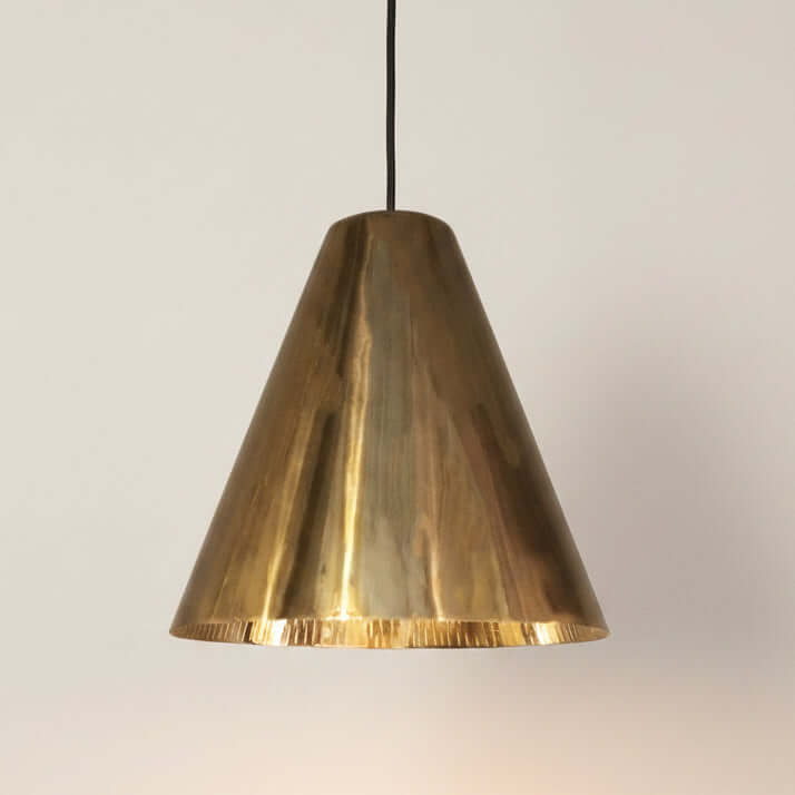 Modern interior with polished brass pendant lights
