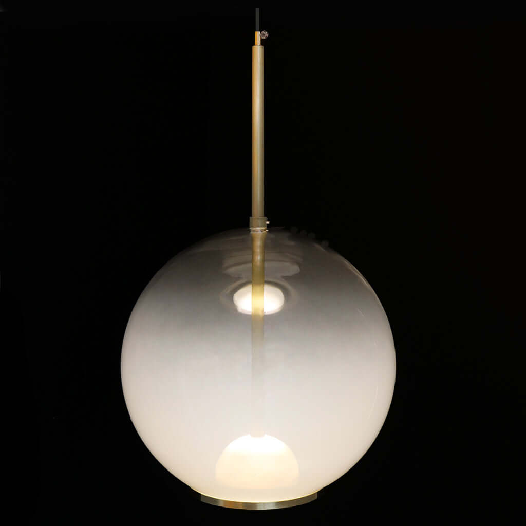 Gradient white to clear glass pendant with brass fittings