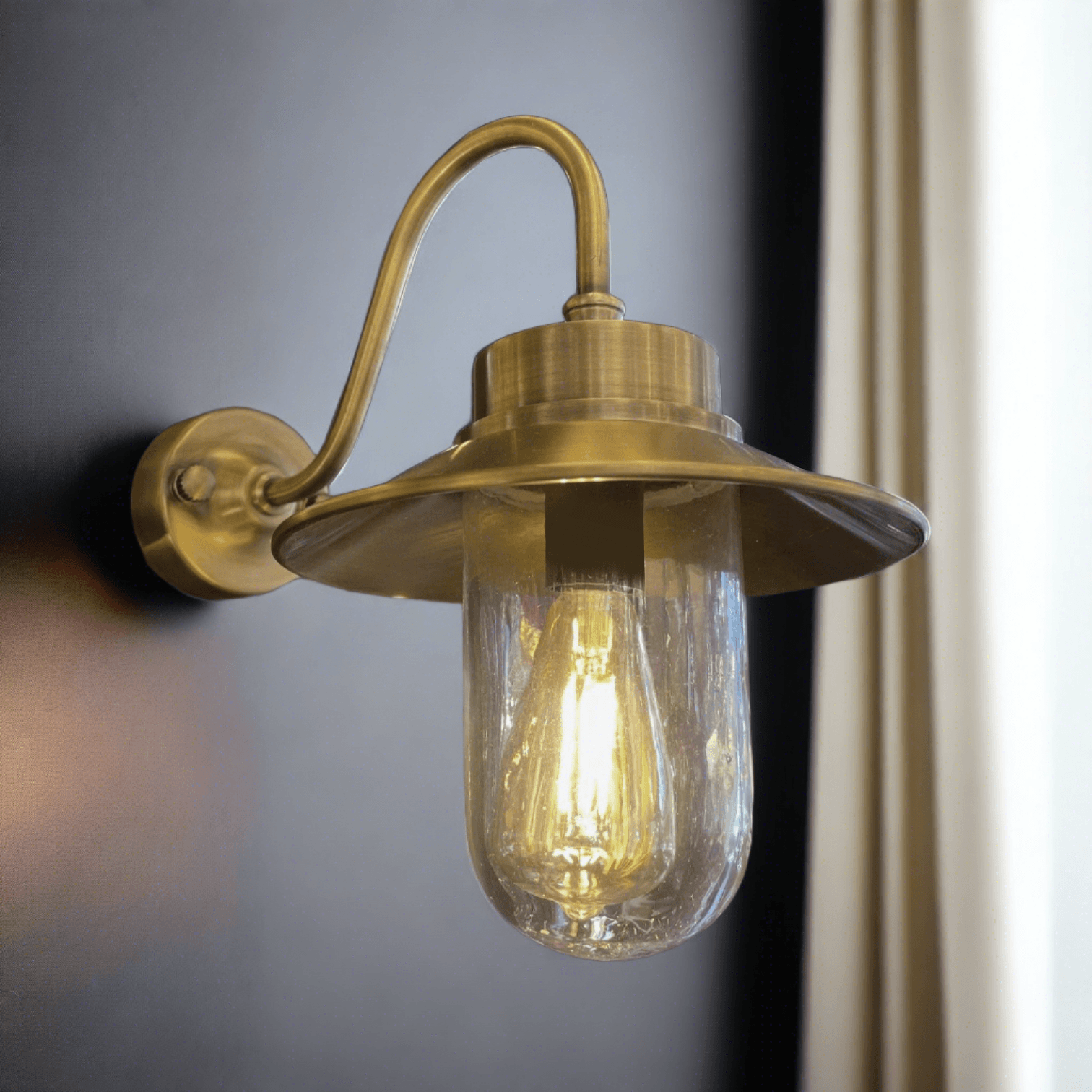 Brass and glass indoor outdoor wall light