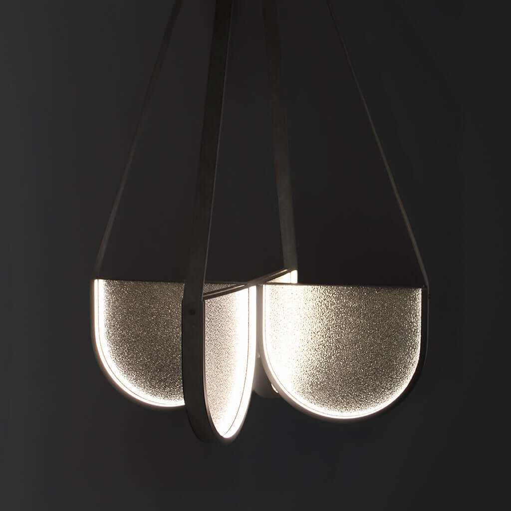 Modern pendant light with a handmade glass on a black background