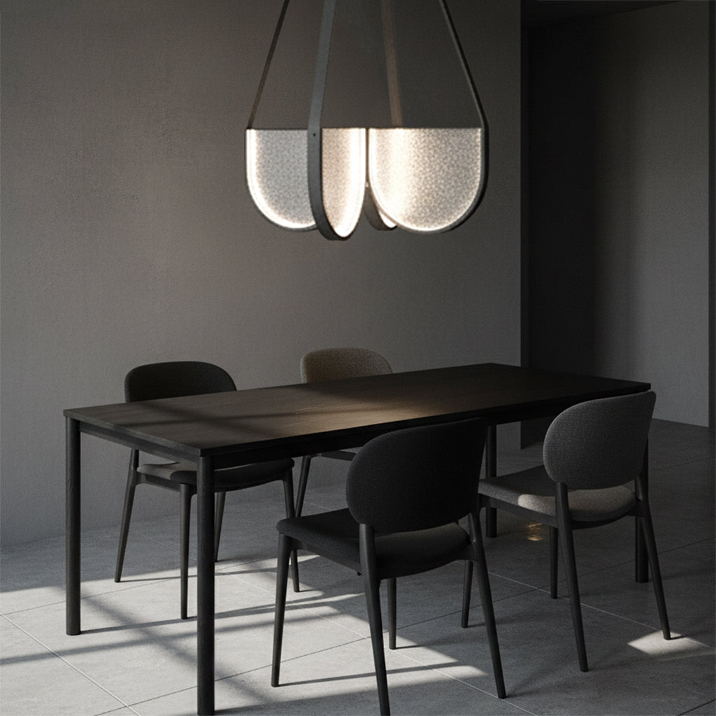 Modern pendant light with a handmade glass on a black background