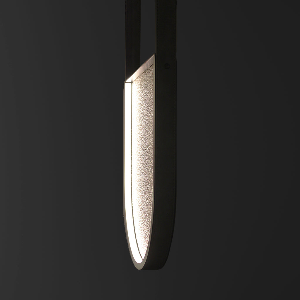 Modern pendant light fixture on a black background