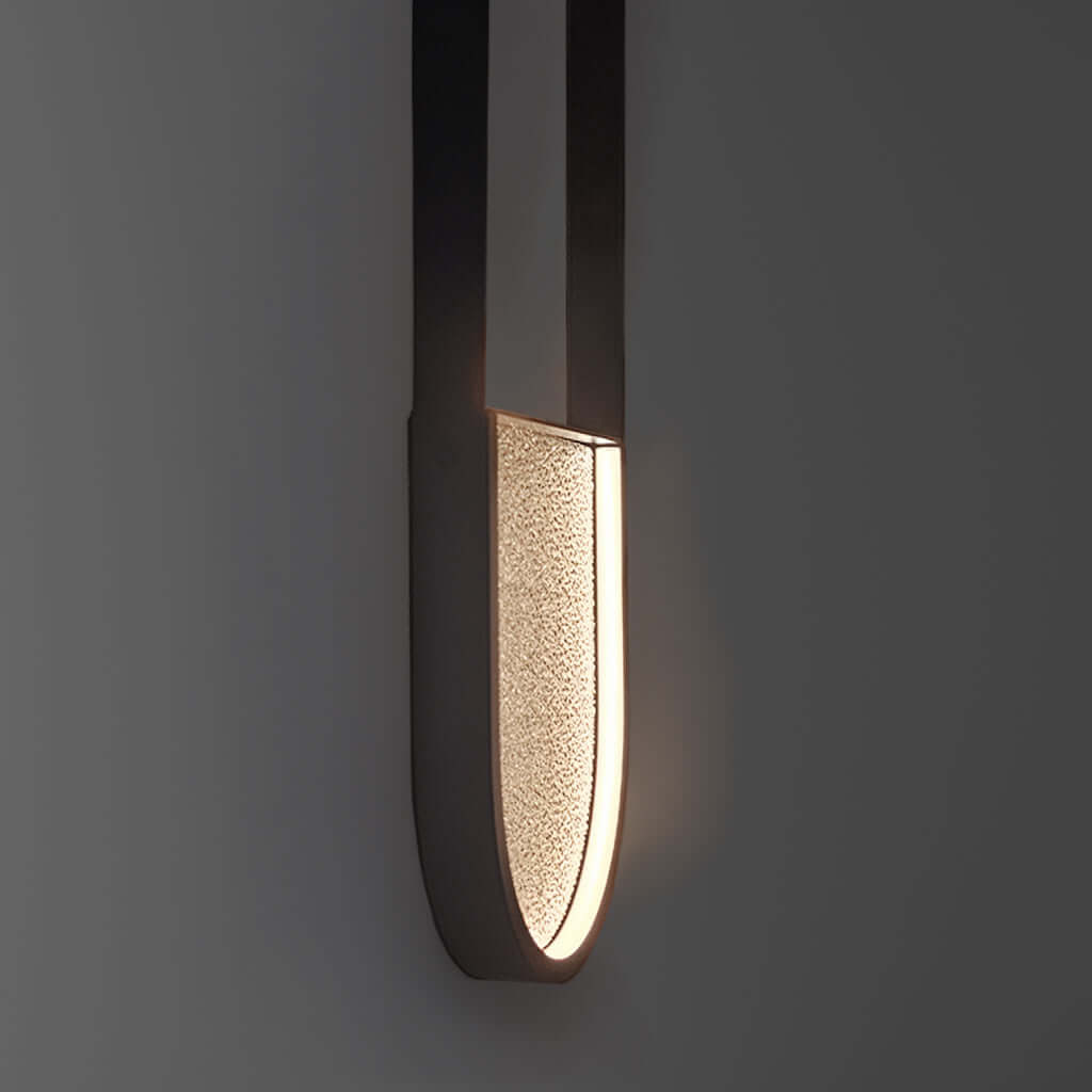 Modern pendant light fixture on a dark gray background