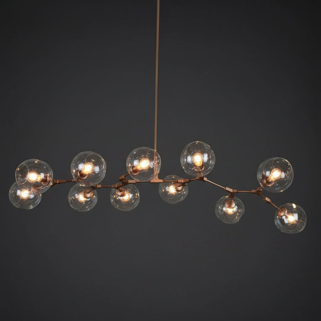 Modern pendant light with multiple glass shades on a white background