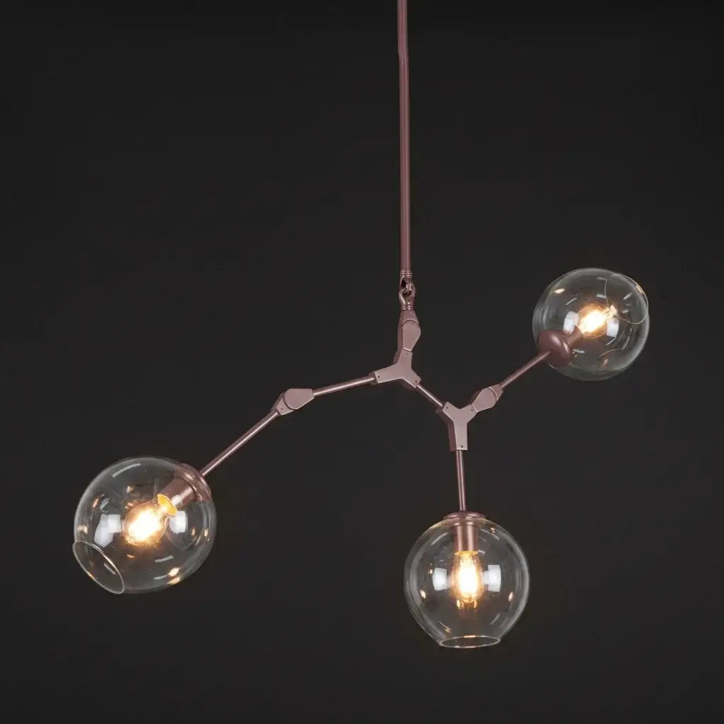 Modern chandelier with three glass bulbs on a dark background
