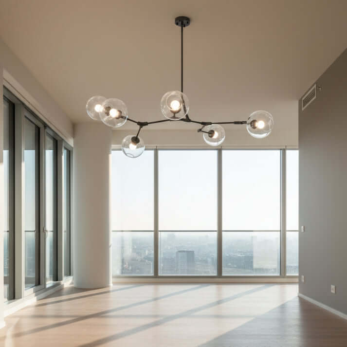 Modern chandelier with glass circular shades on a white background