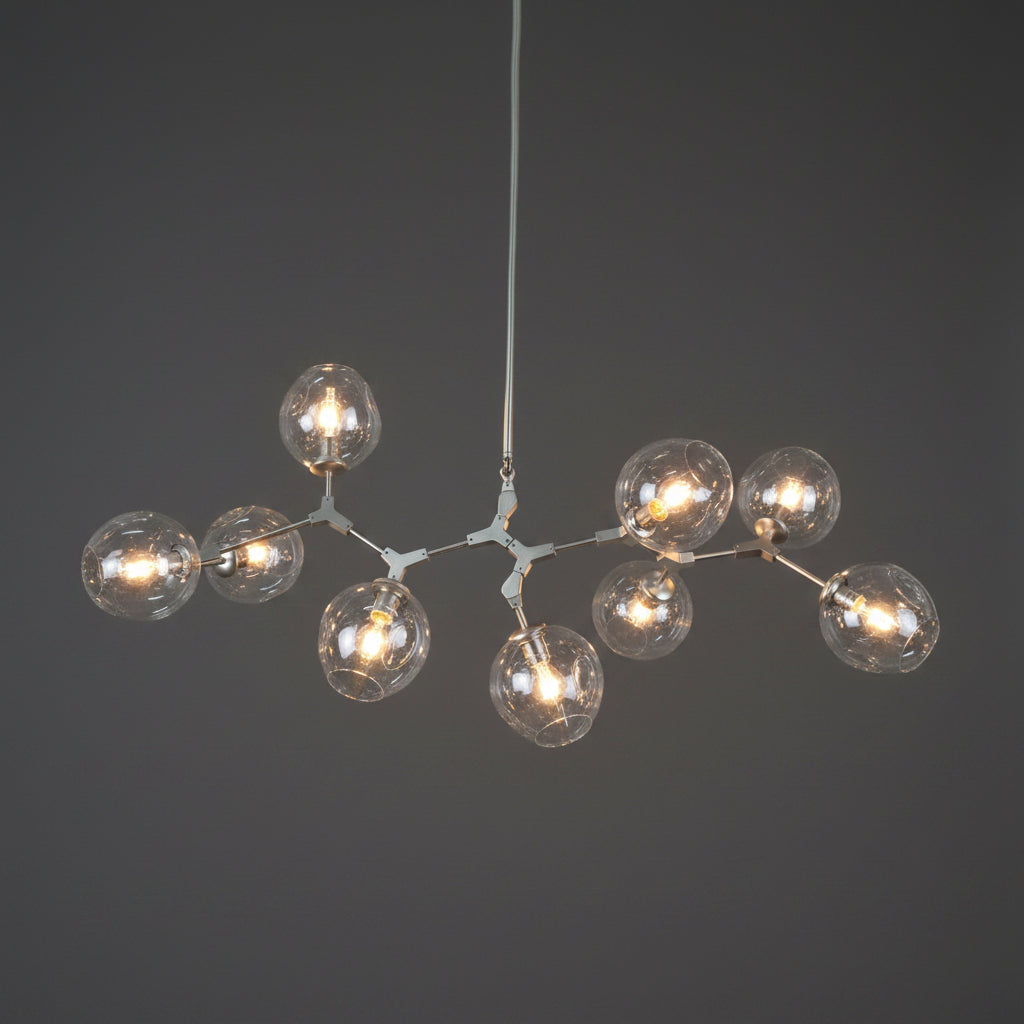Modern chandelier with multiple glass bulb shades on a white background