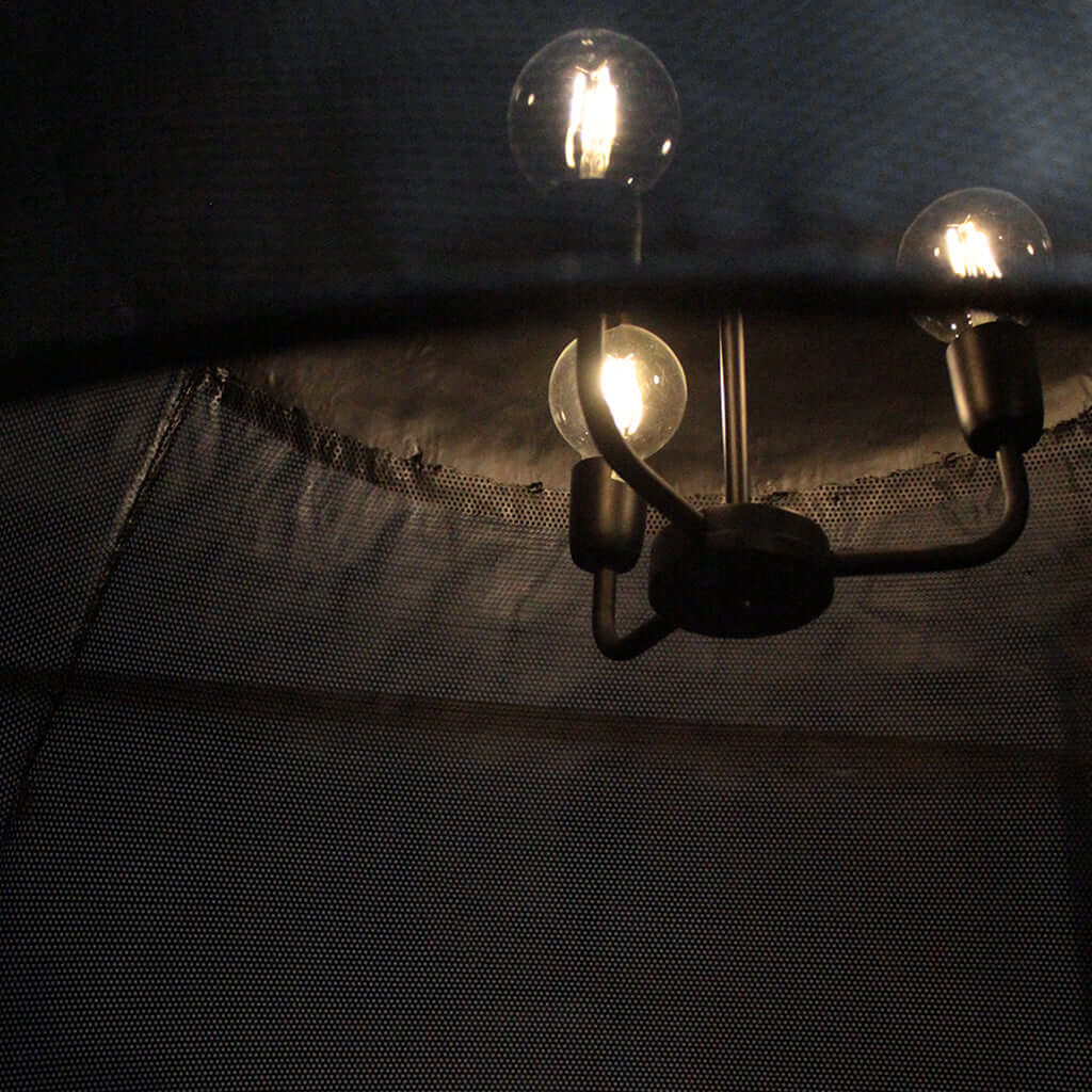 Light fixture with three bulbs with textured surface