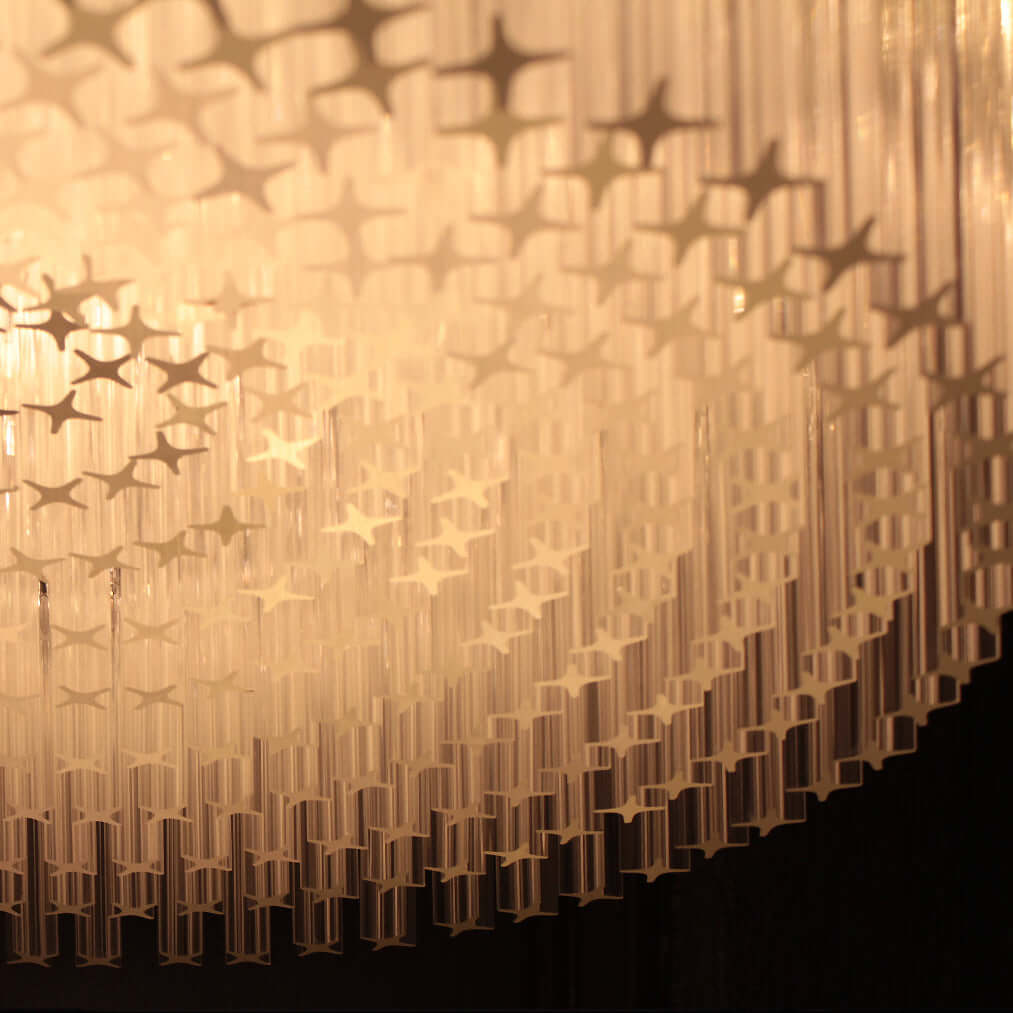 Close-up of a decorative ceiling light fixture with intricate design