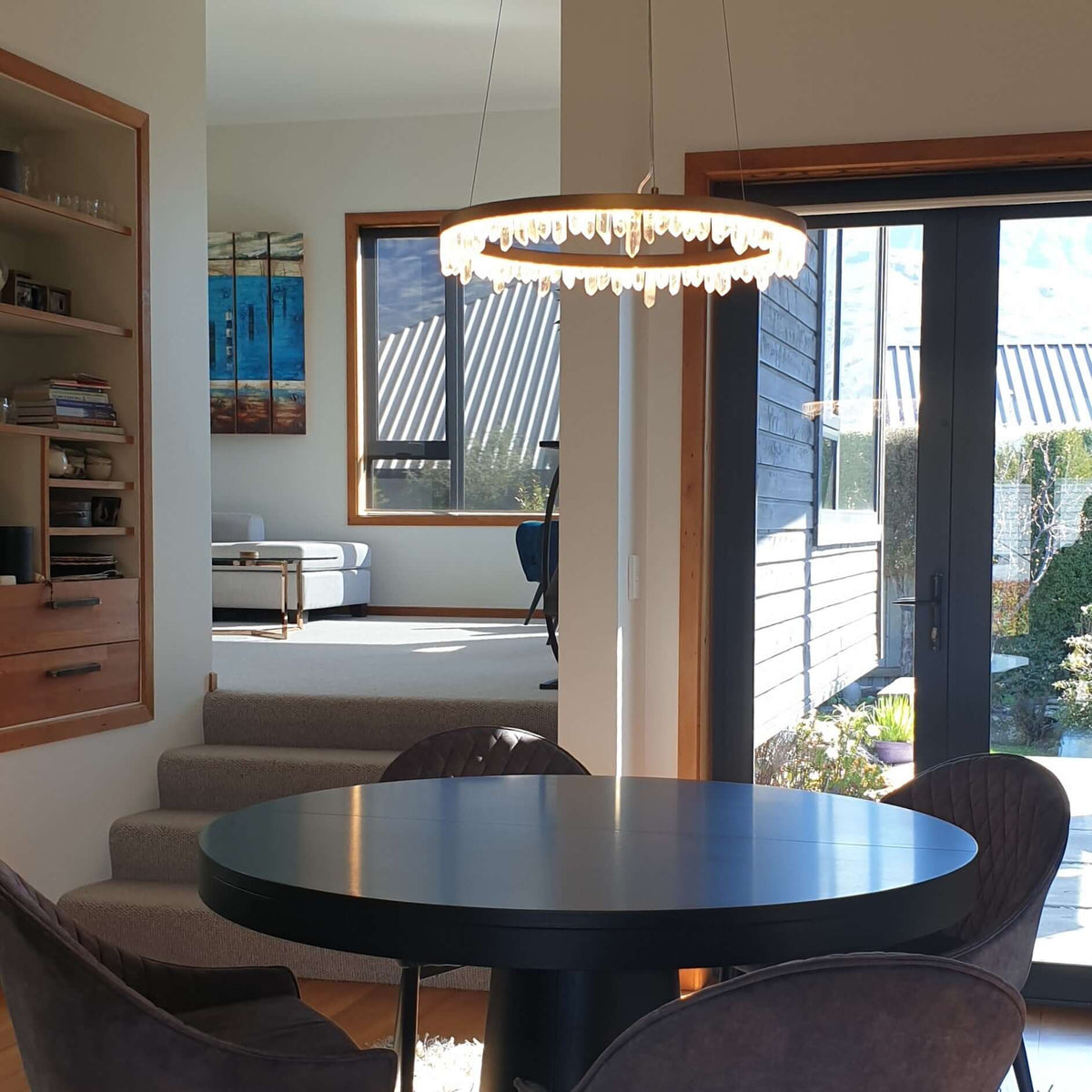 Crystal ring pendant over dining table