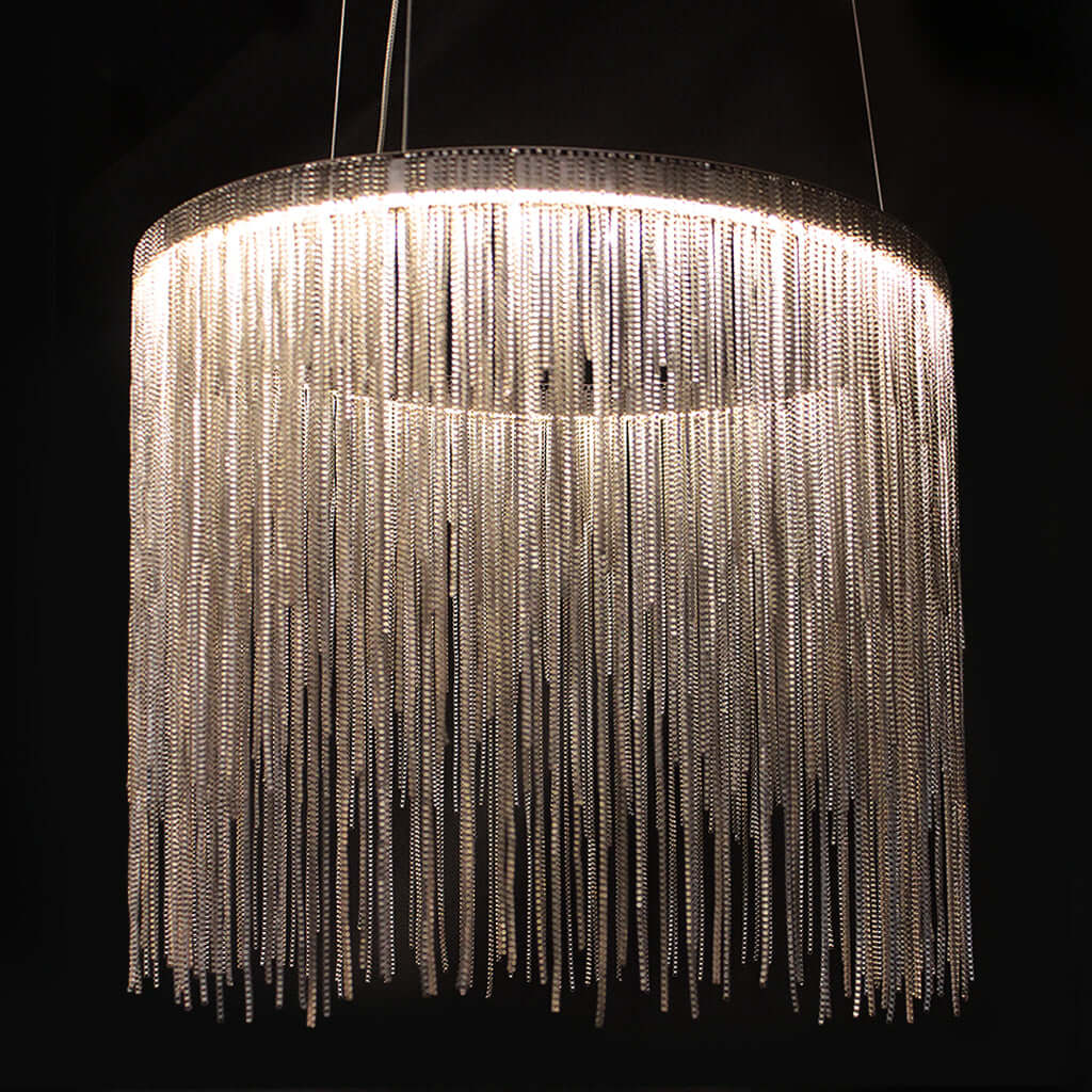 Chandelier with metal strands on a black background