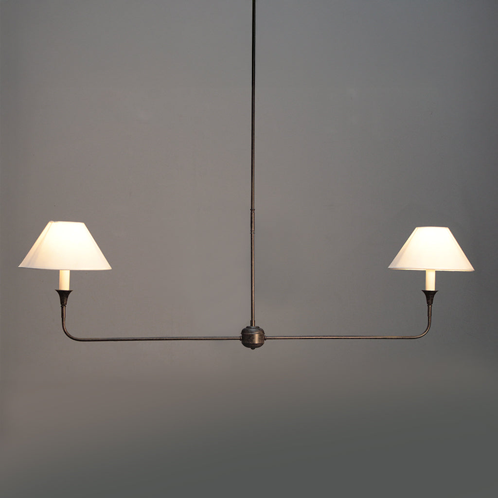 Modern pendant light with two lampshades on a gray background