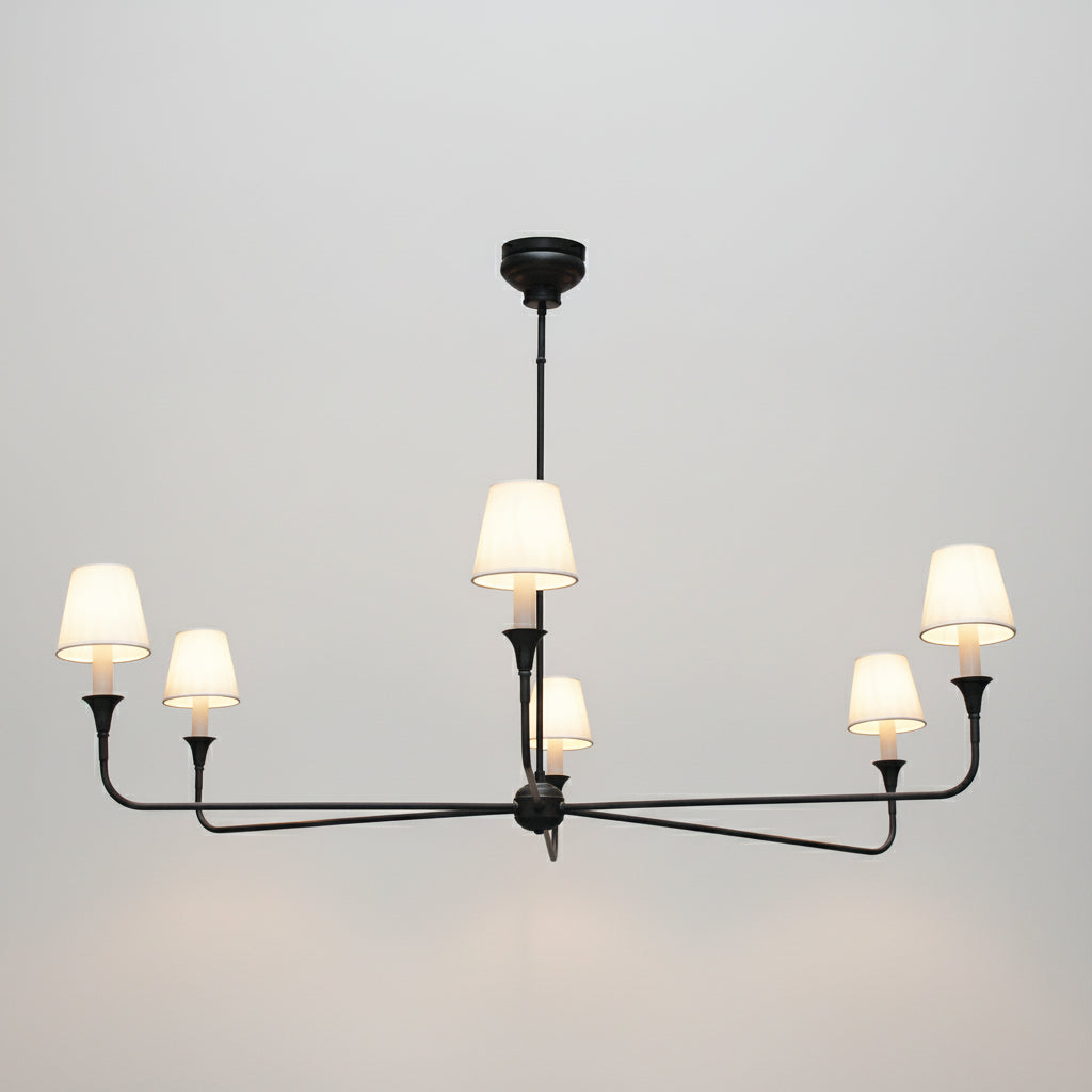 Modern chandelier with multiple light bulbs on a gray background