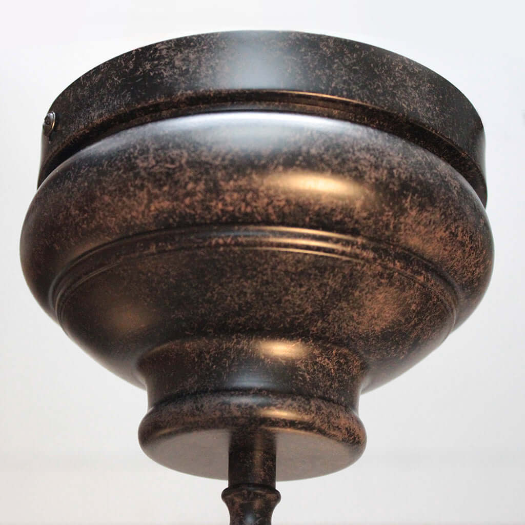 Bronze-colored ceiling medallion on a white background