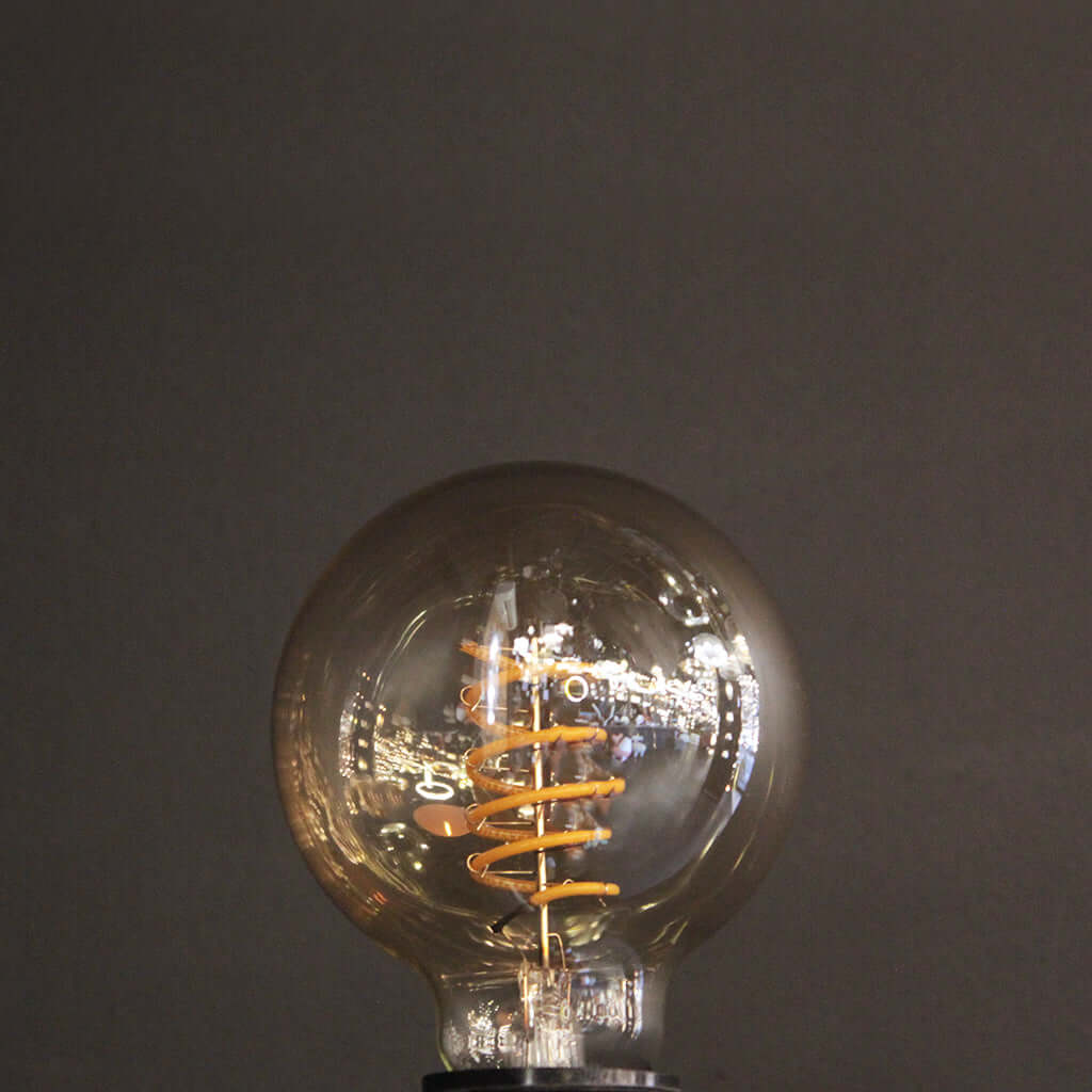 G80 Amber Glass Spiral Filament 4W 3000K Dimmable E27 Light Bulb
