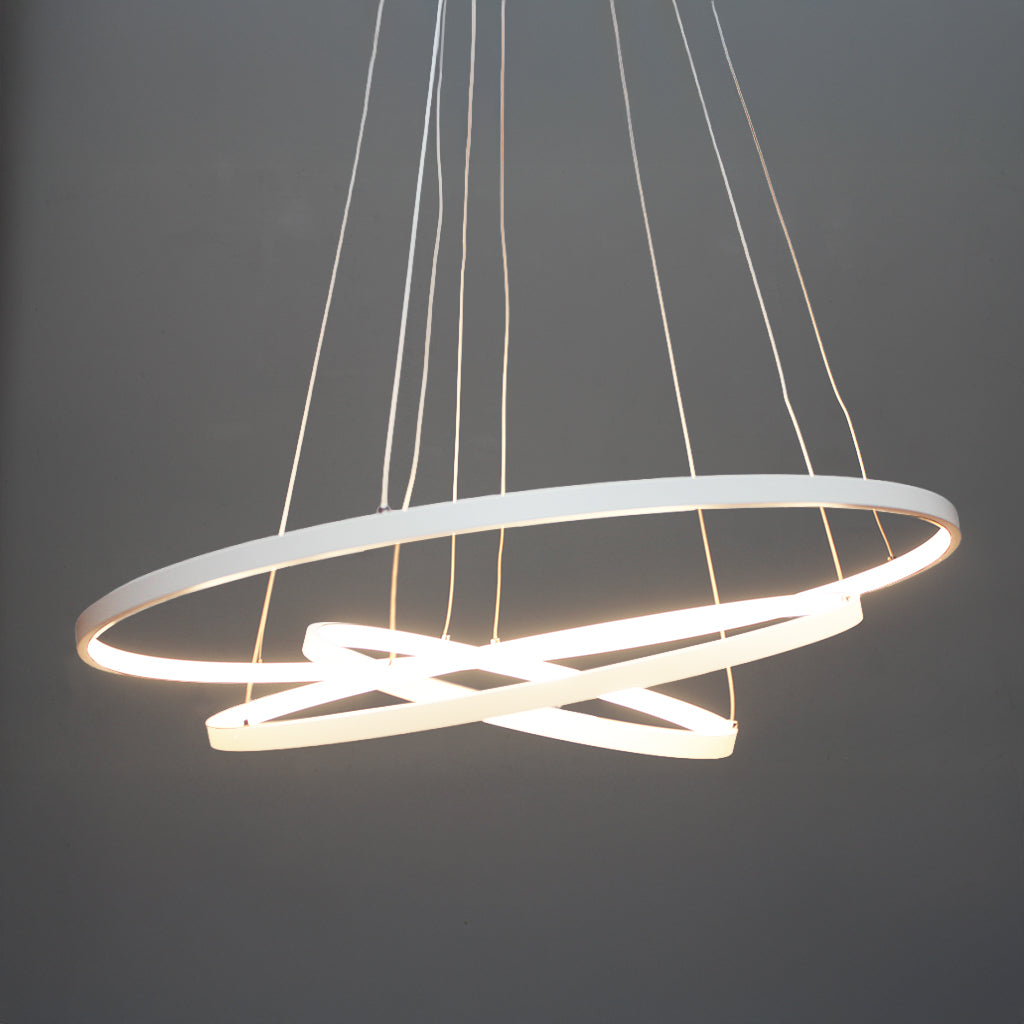 Three white rings pendant on dark background