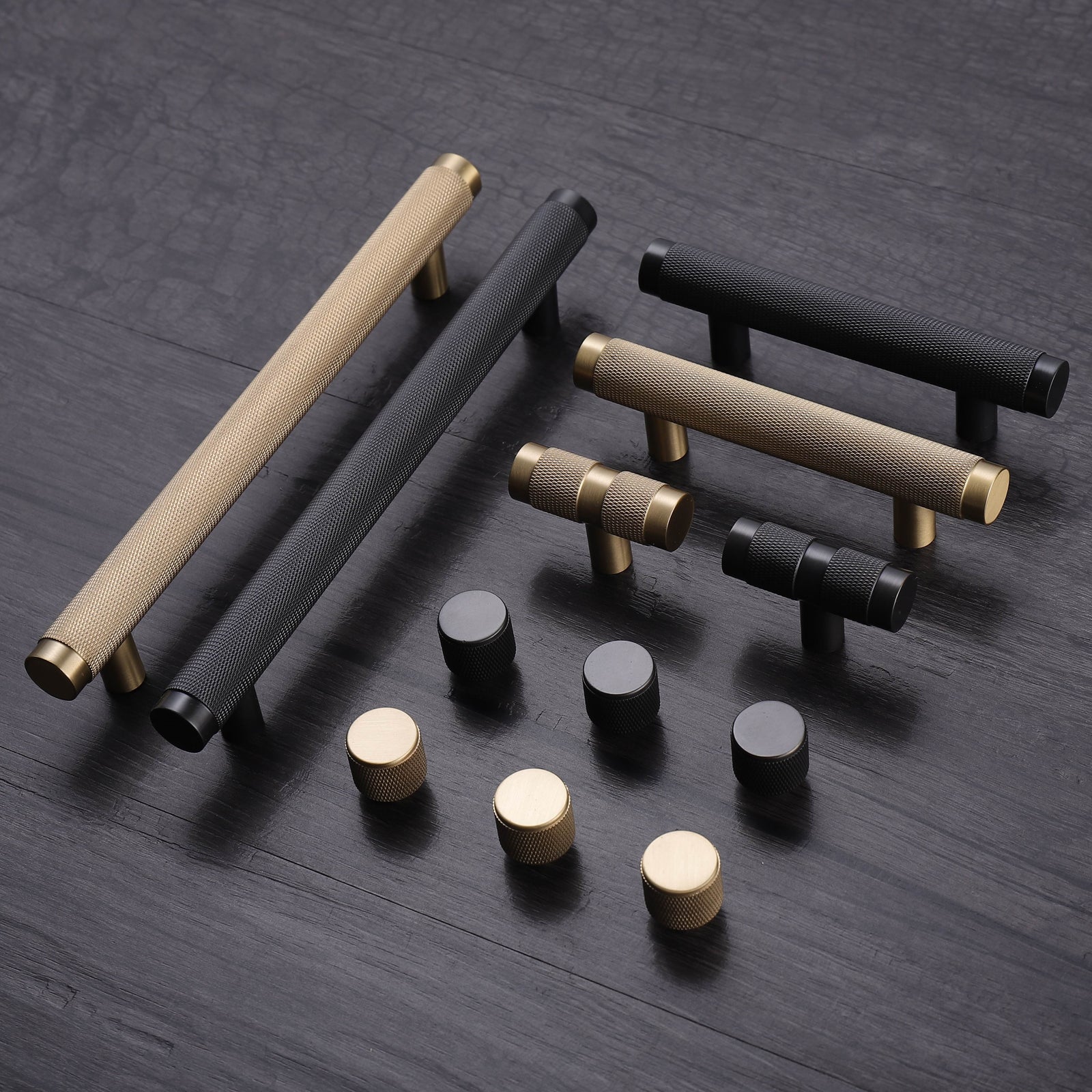 A black brass handle T-pull on a white background.