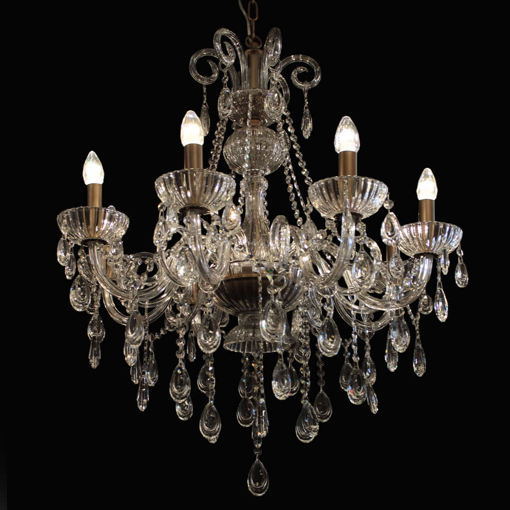 Crystal chandelier with eight lights on a black background