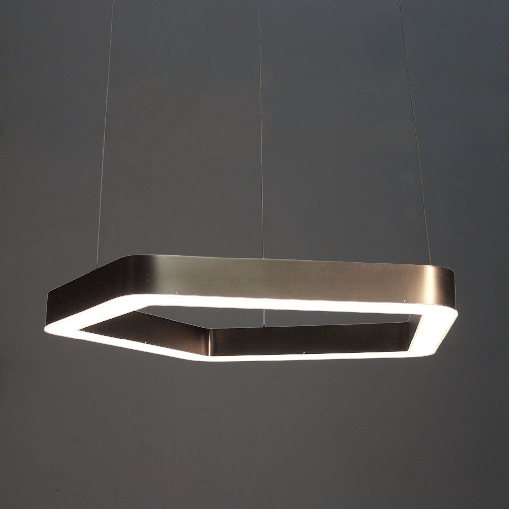 Hexagonal pendant light fixture on a dark background