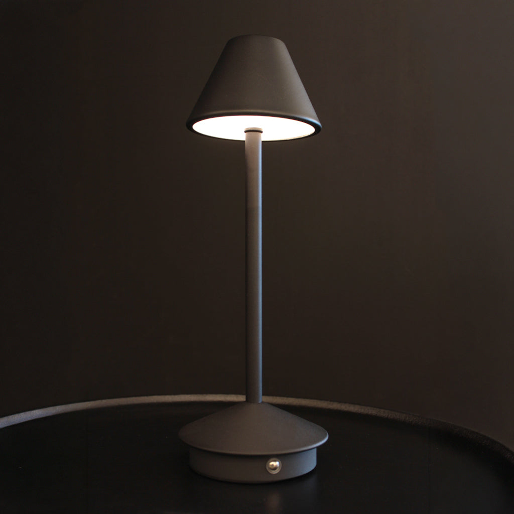 Matt black rechargeable portable table lamp with tapering shade and base