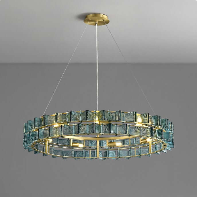 Handmade textured blue glass on a gold round pendant light frame