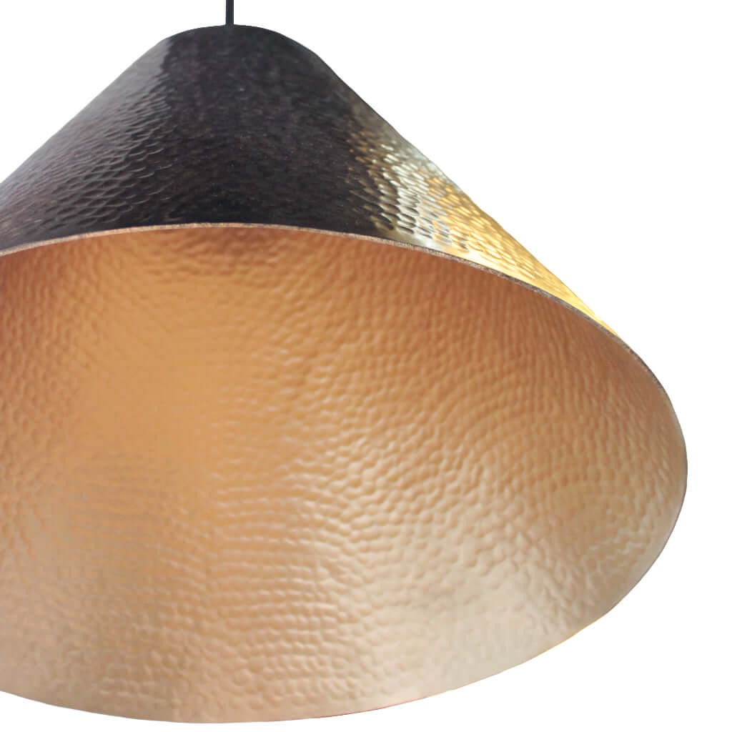 Hanging lamp with textured surface on a white background