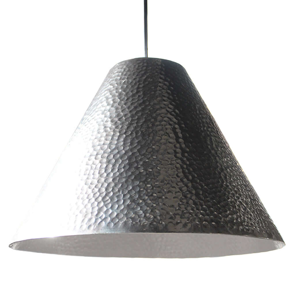 Textured pendant light on a white background