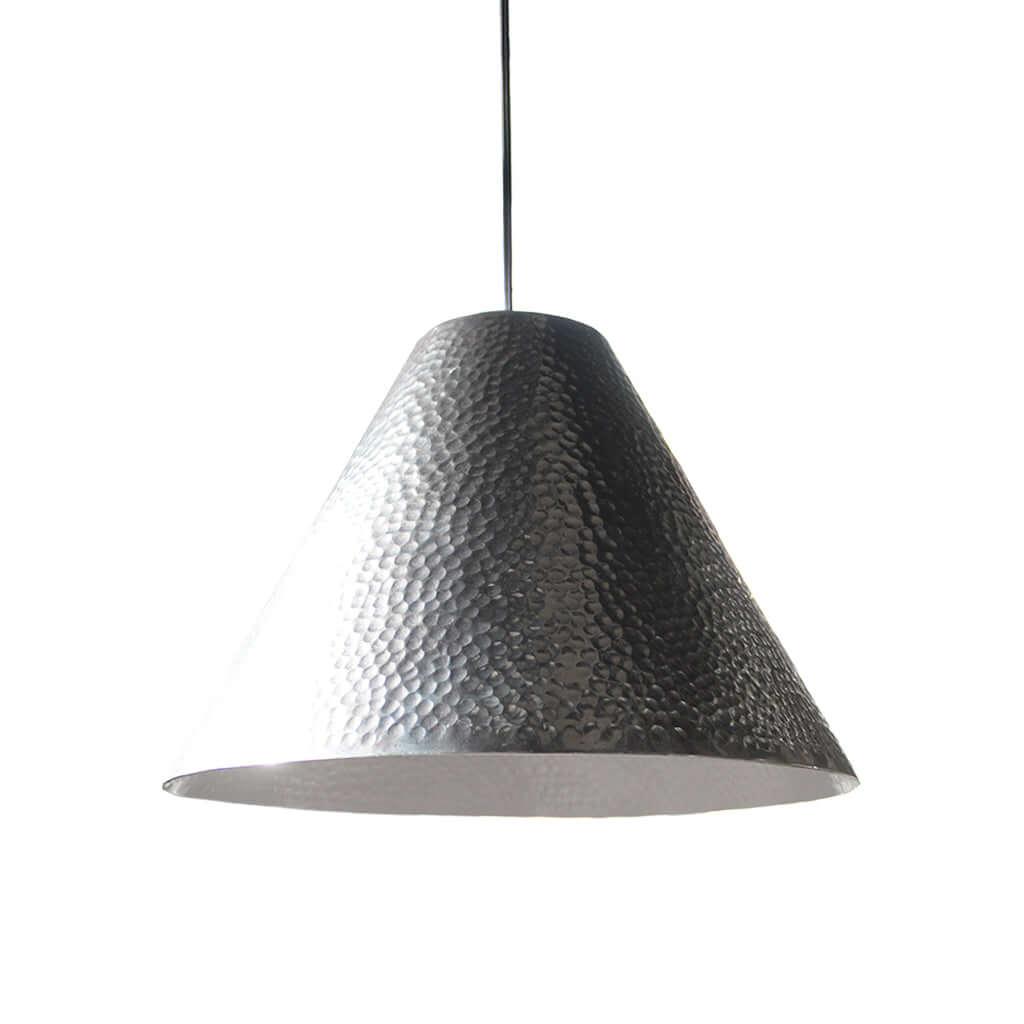 Textured pendant light on a white background