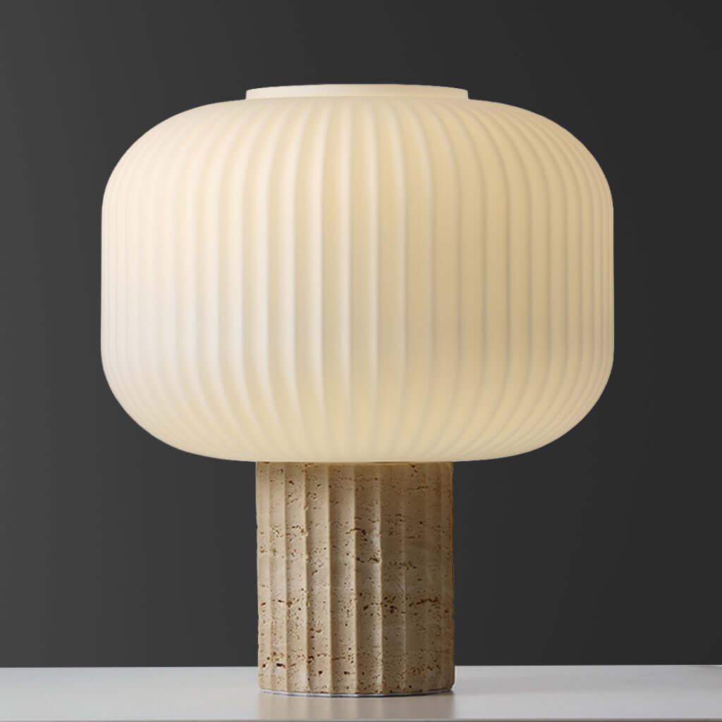 Table lamp with ribbed design on a dark background