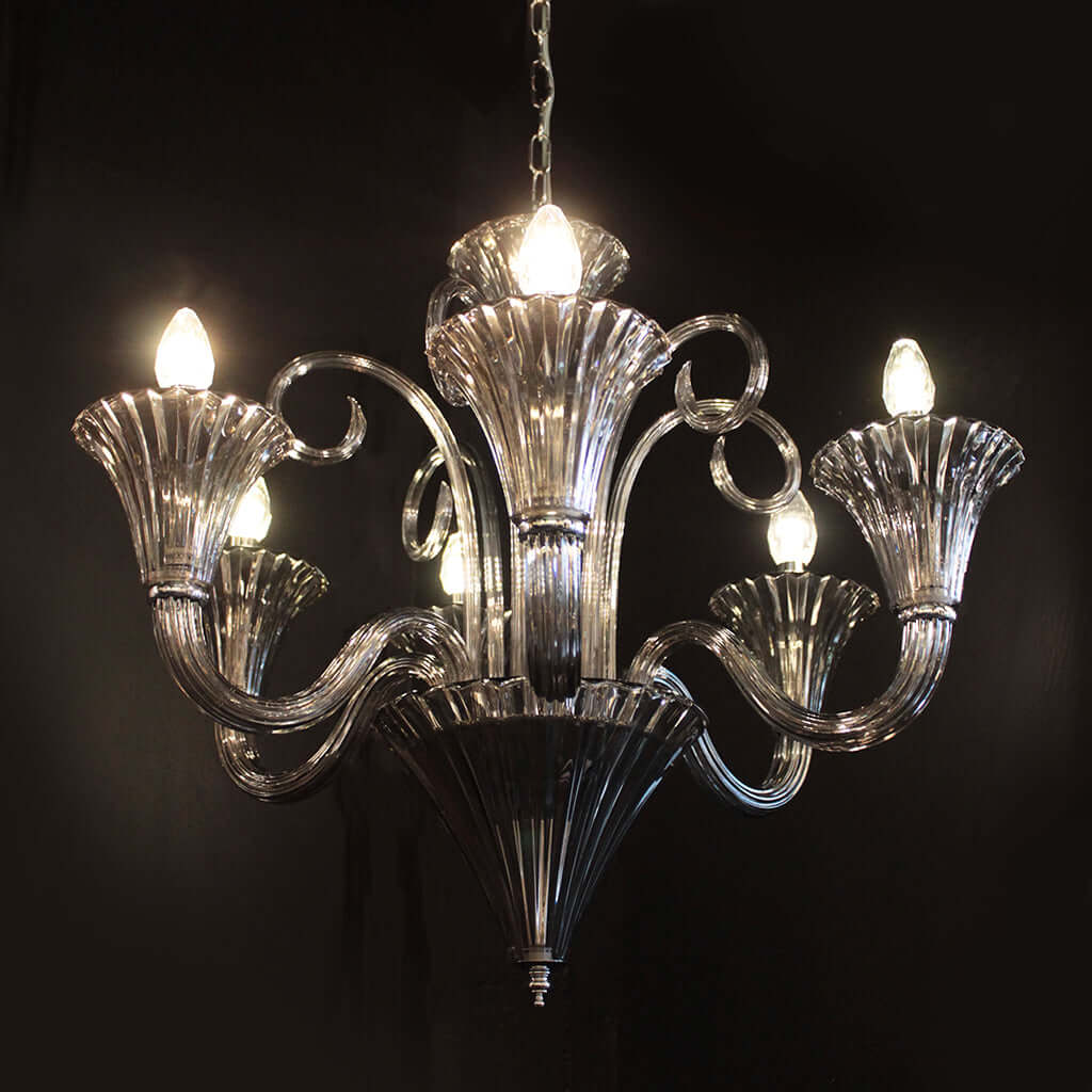Smoke Grey chandelier with six lights on a black background