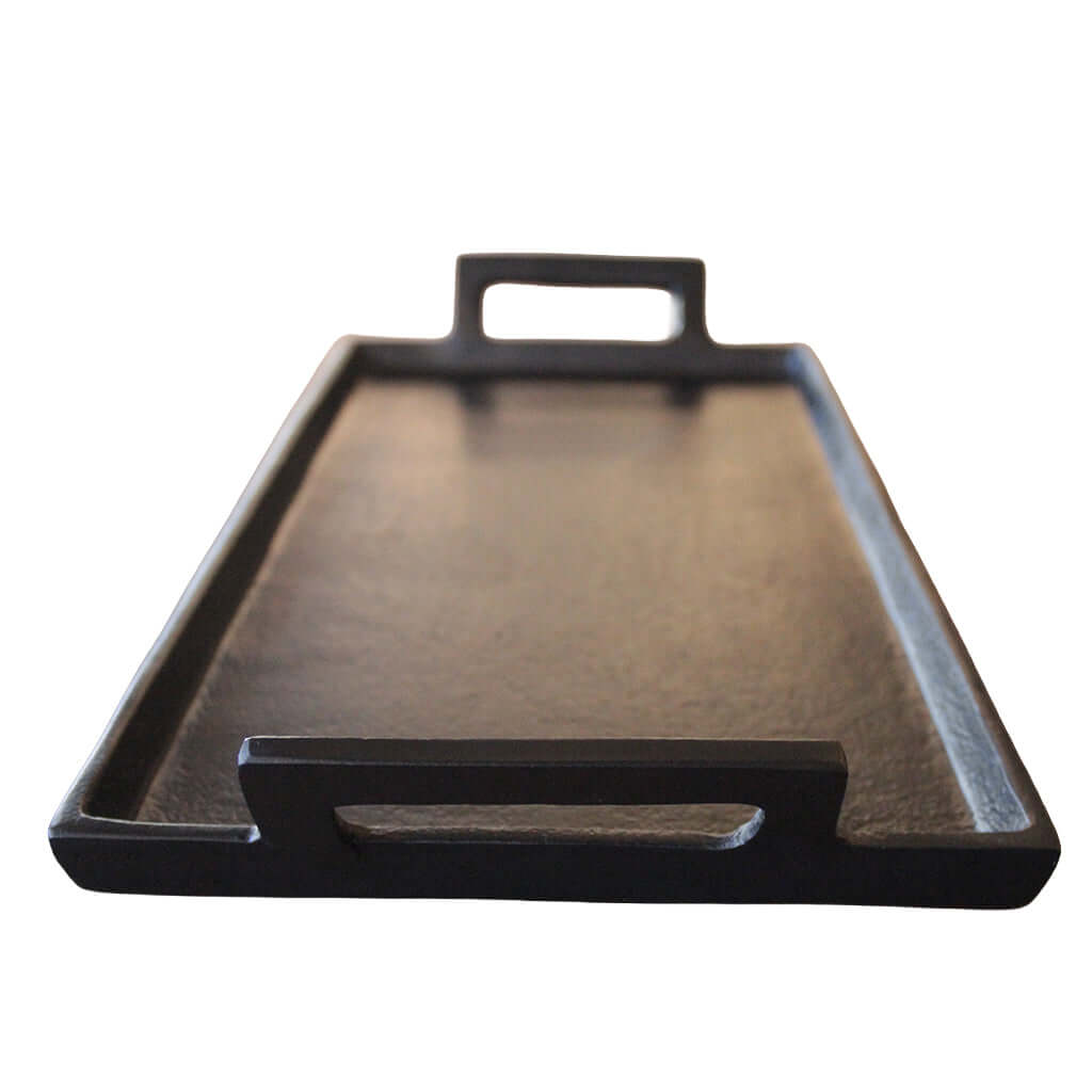 Black iron platter or tray with handles on a white background