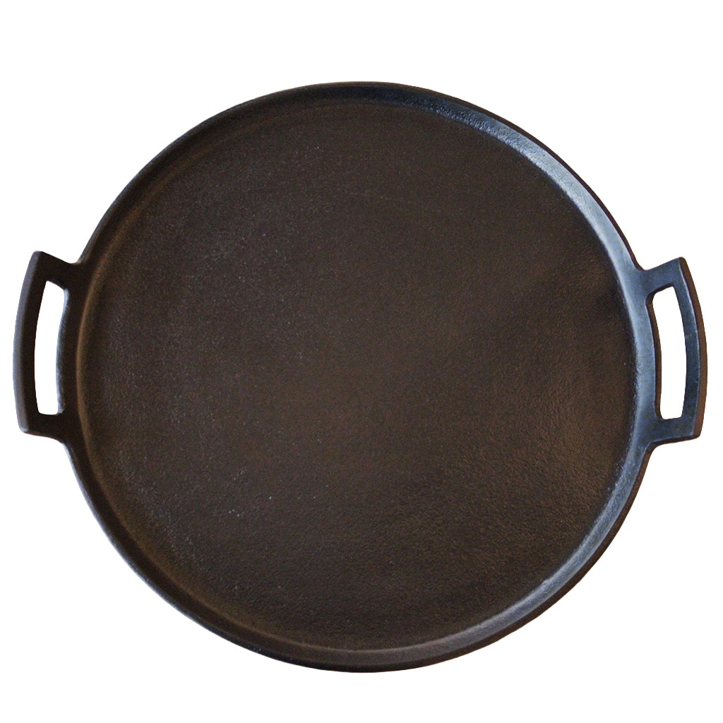 Round black tray with handles on a white background