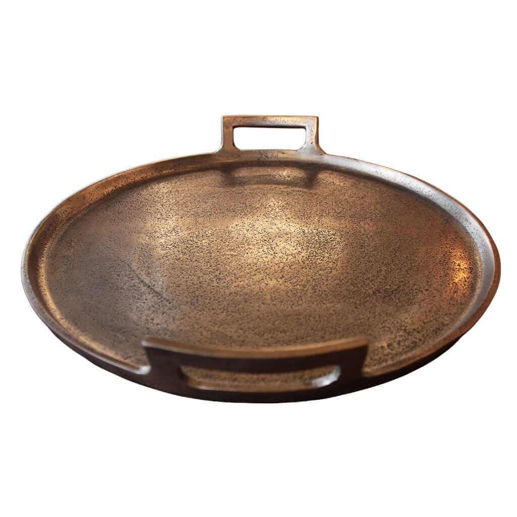 Bronze-colored platter with a handle on a white background