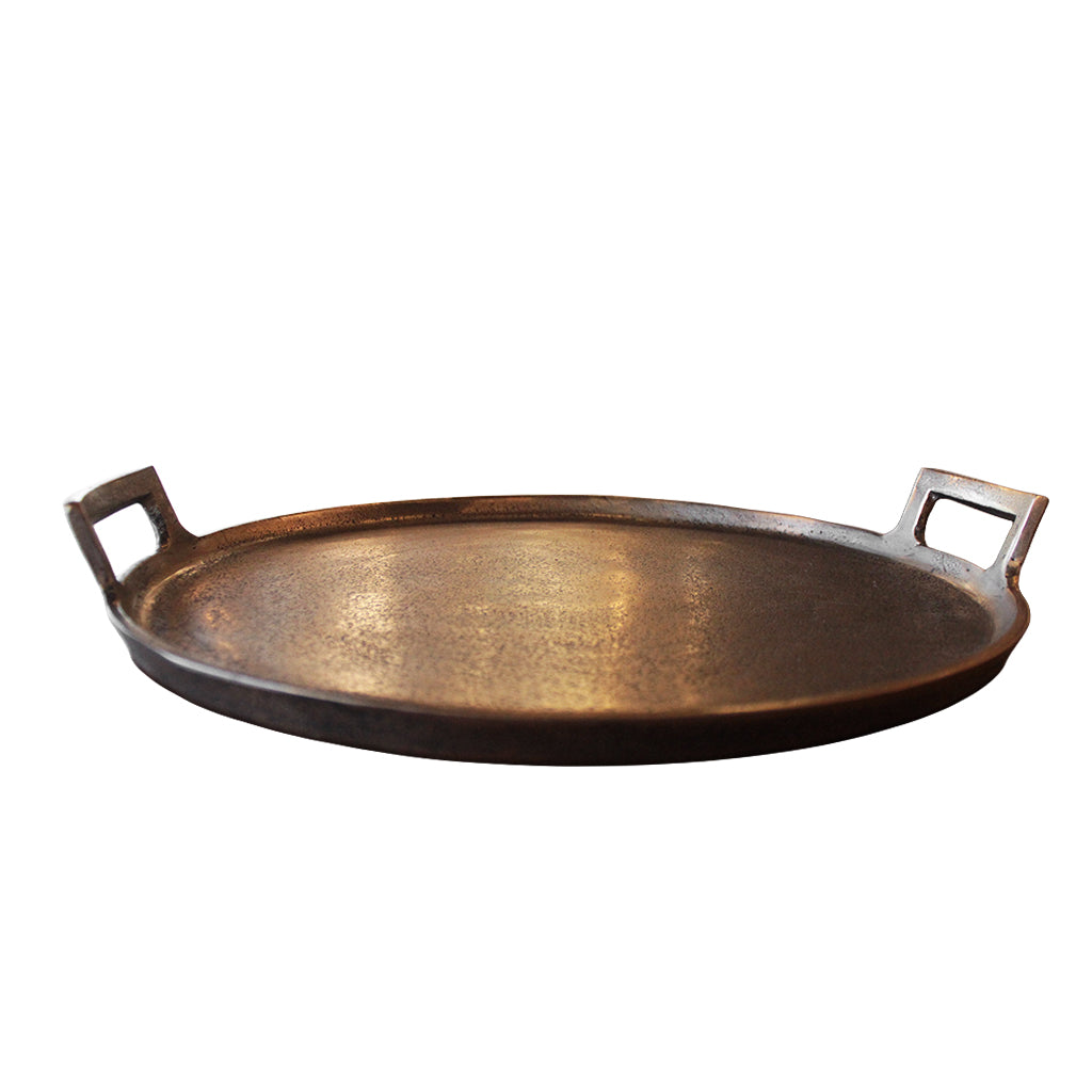 Bronze tray with handles on a white background