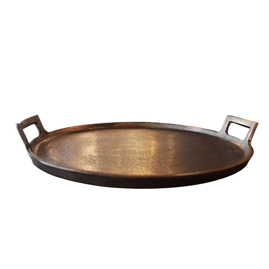 Bronze tray with handles on a white background
