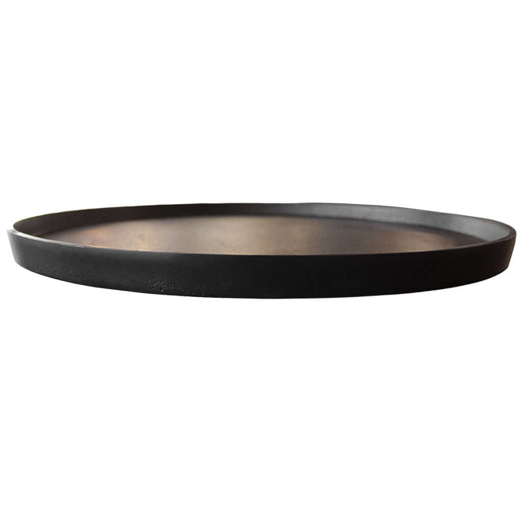 Black round tray on a white background