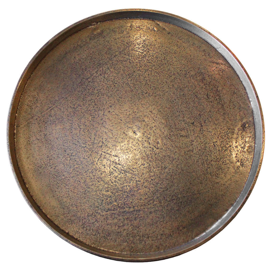 Round metallic object with a textured surface on a white background