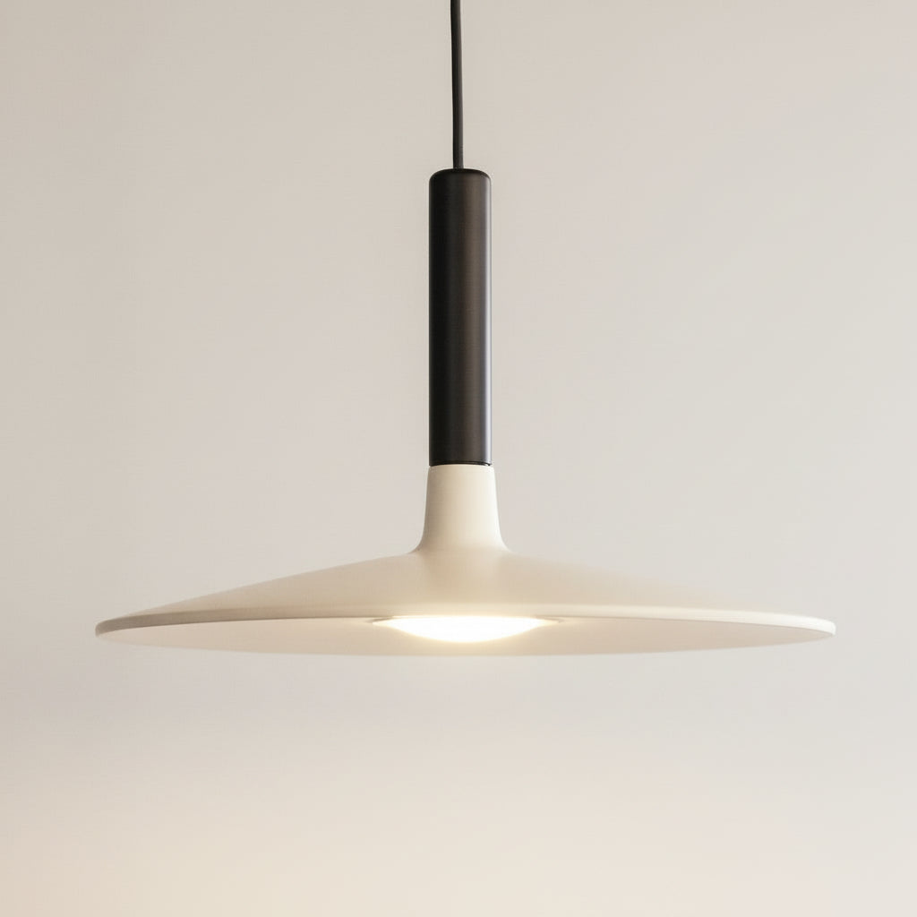 Modern pendant light with two white lampshades on a dark background