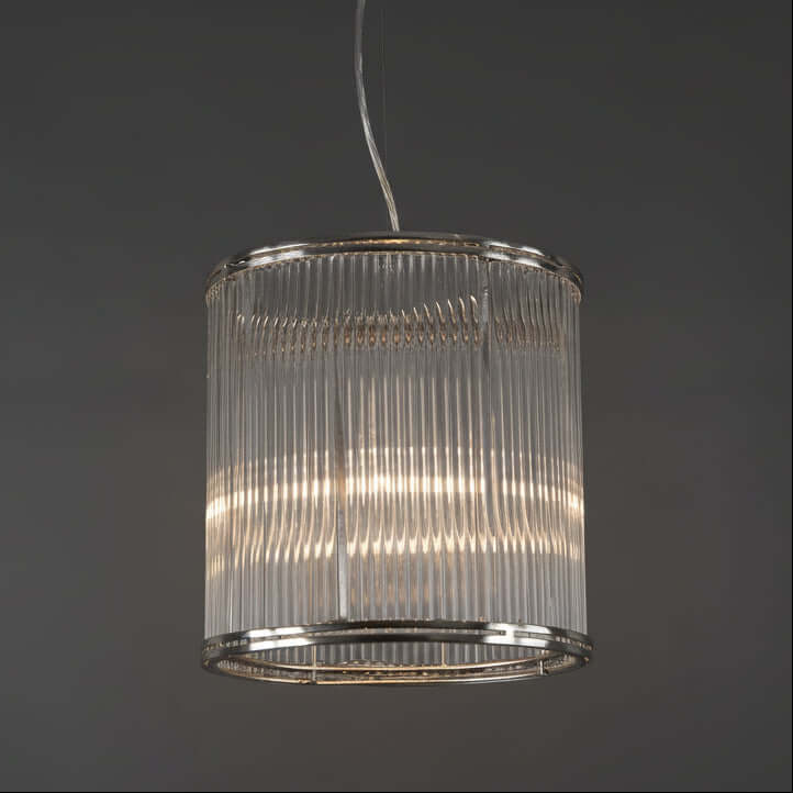 A cylindrical nickel framed pendant light with vertical clear glass rods.
