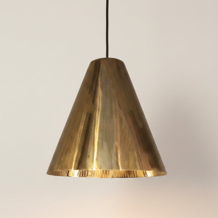 Modern interior with polished brass pendant lights