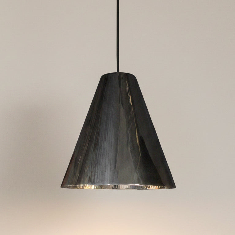 Silver pendant light on a white background