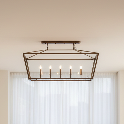 Decorative ceiling light fixture in a room with white curtains