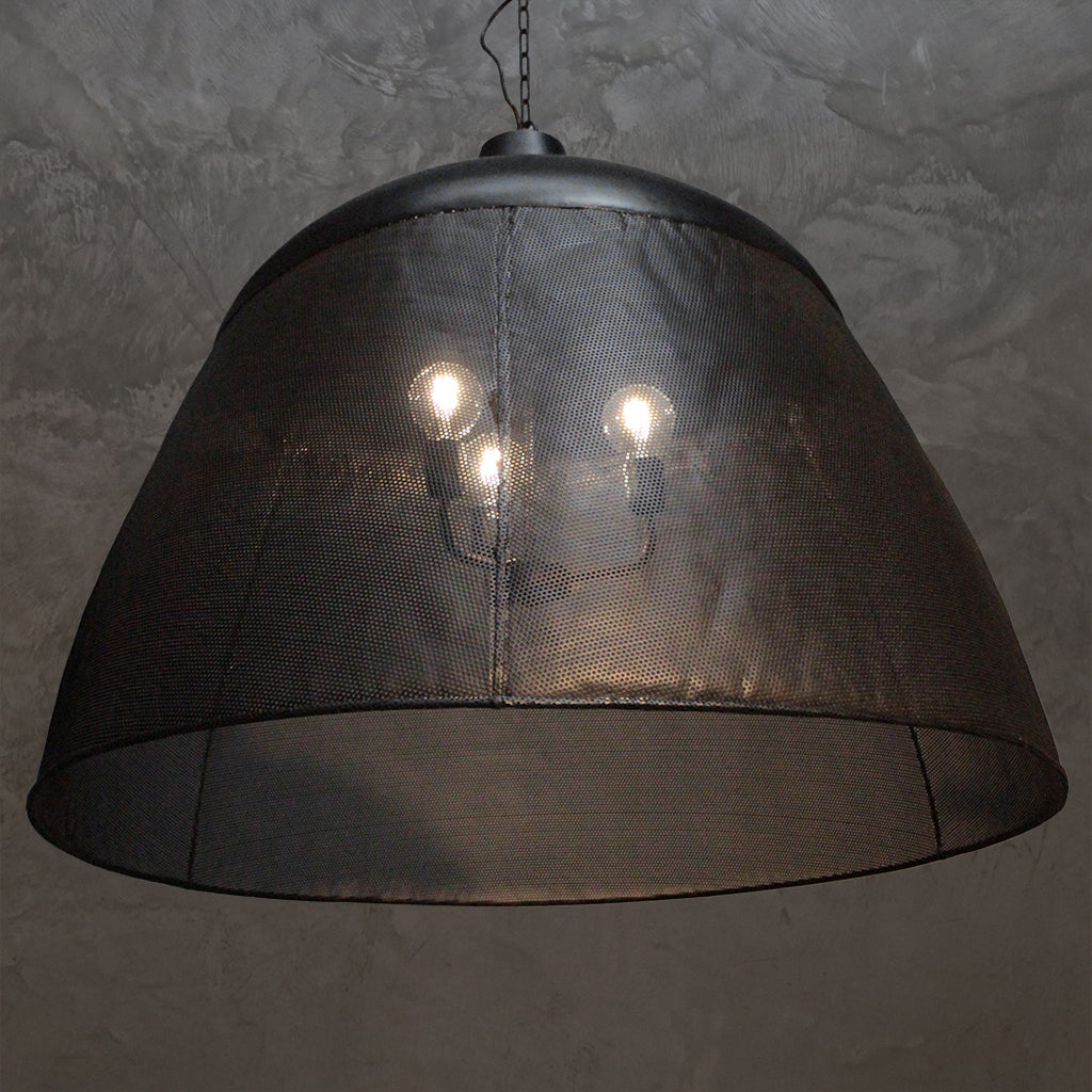 Black mesh pendant light fixture on a dark background