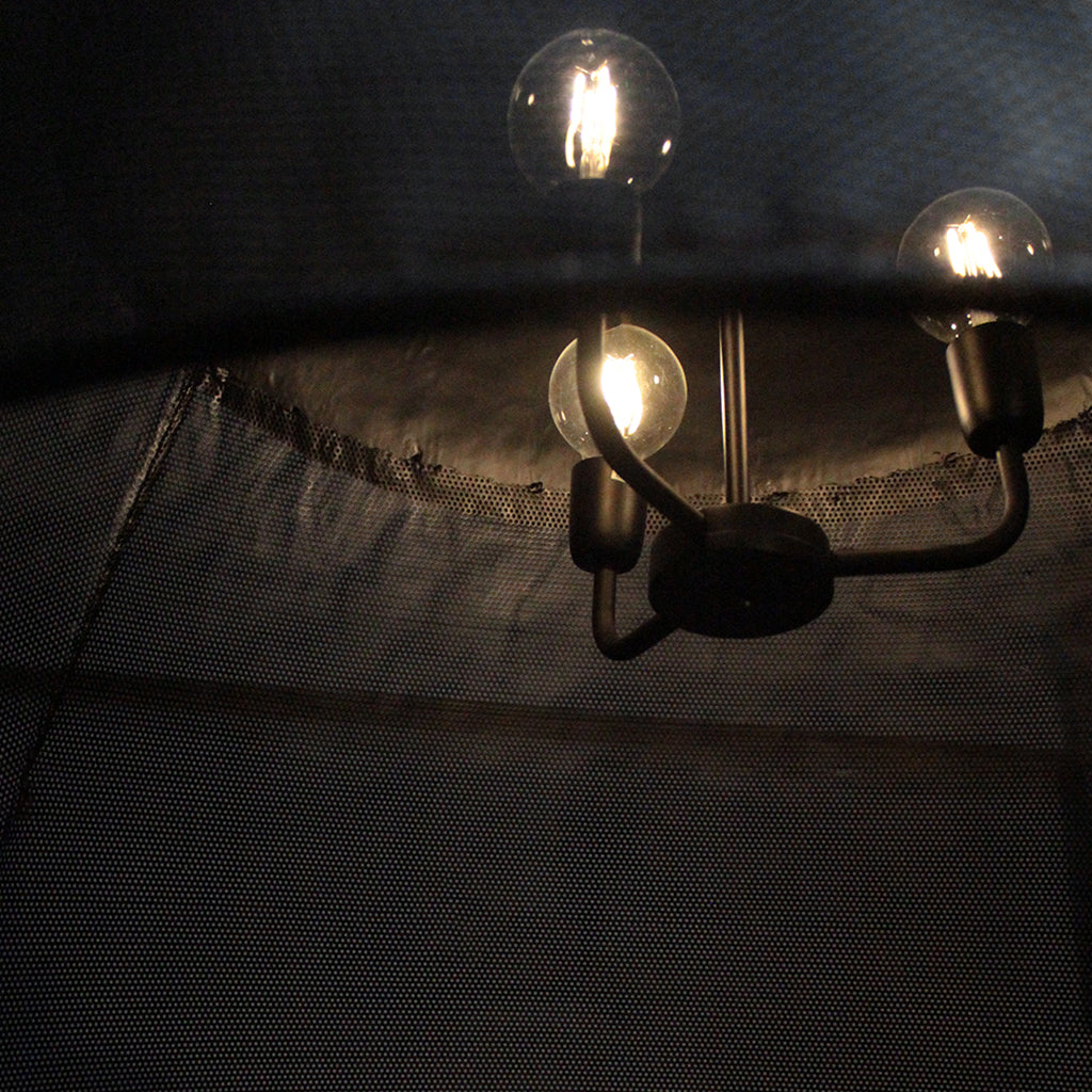 Light fixture with three bulbs with textured surface