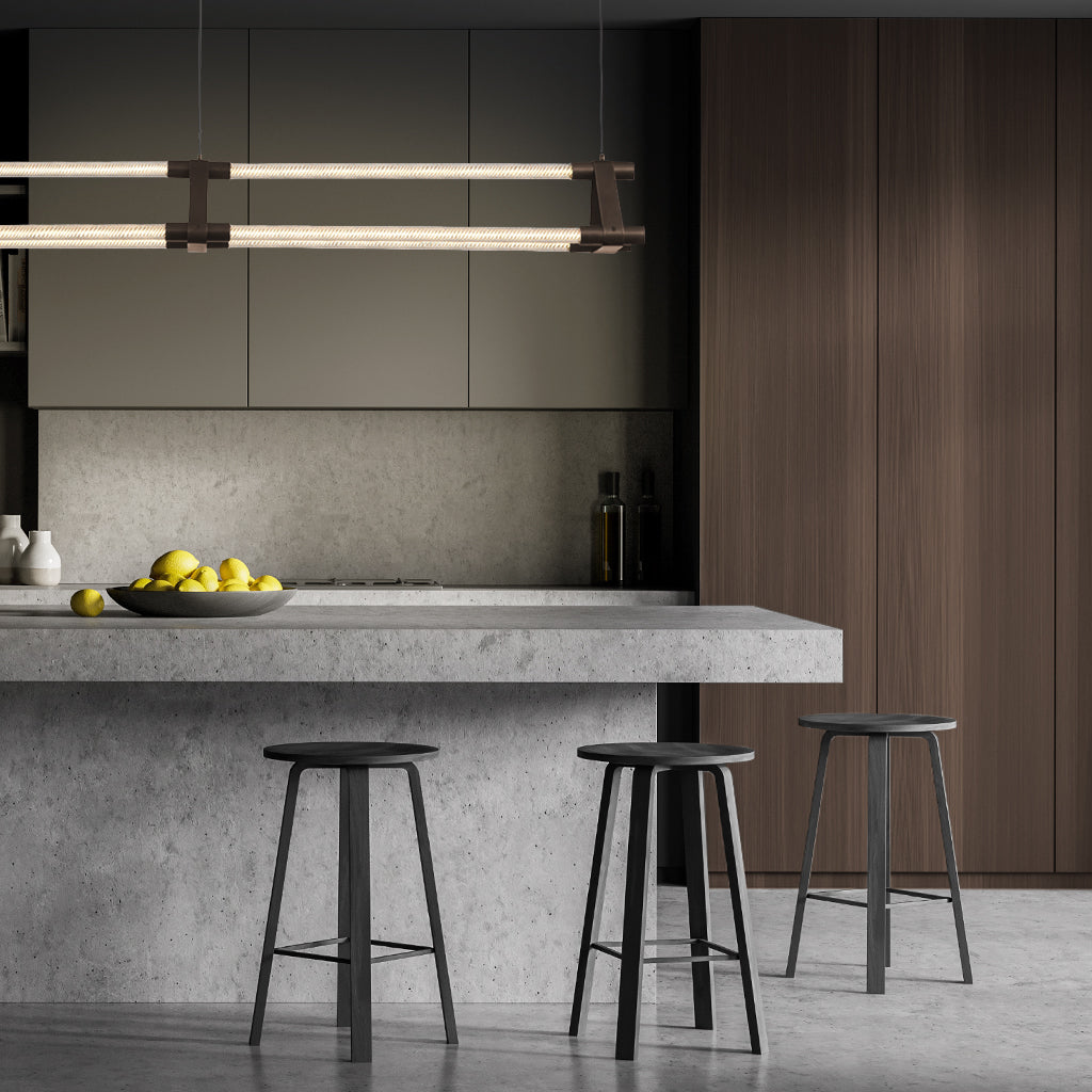 Modern pendant light fixture on a gray background