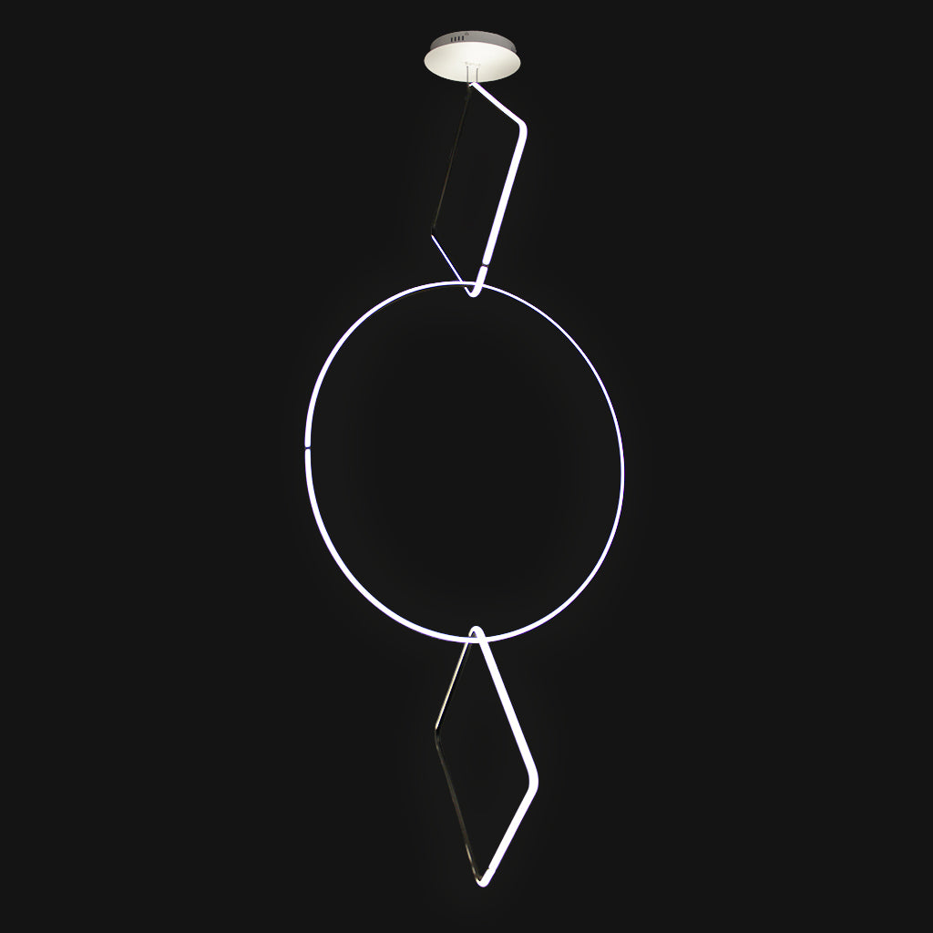 A modern LED linear pendant light in a white finish, featuring a circular ring suspended from a geometric shape with a separate diamond-shaped accent below, shown against a solid black background.