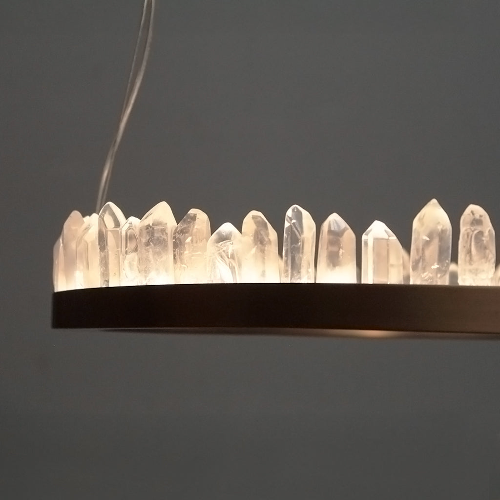 Chandelier with crystal-like elements on a dark background