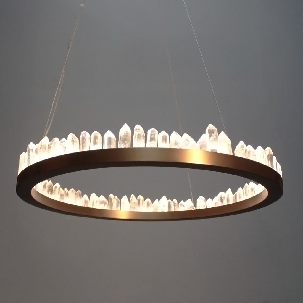 Modern chandelier with crystal-like elements on a gray background