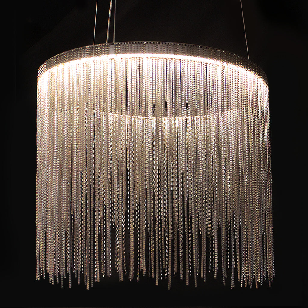 Chandelier with metal strands on a black background