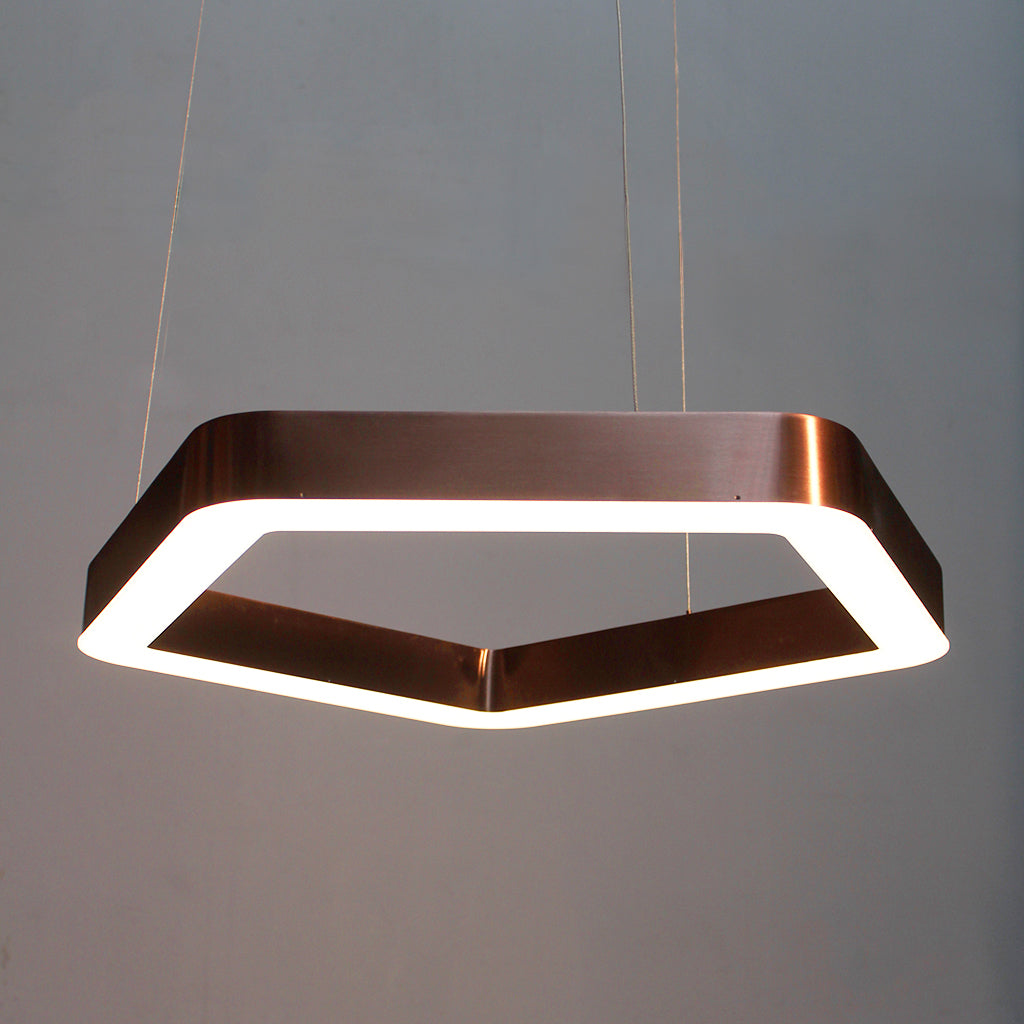 Modern pendant light with a hexagonal design on a gray background